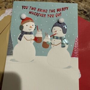 Festive Snowman and Penguin Holiday Card